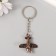 Metal keychain "Aircraft with propeller" propeller spins 3.9x3.7 cm