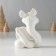 Souvenir ceramics "White snake with a bow, with a $ coin" with gold 3x7.5x9.3 cm