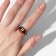 Ring "Montrustrik" with four horns, the color is black, dimensionless