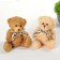 Soft toy "Bear with a bow", color mix