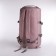 A backpack-samka with a zipper, 4 outer pockets, shoe detachment, pink color