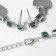 Set 4 objects: earrings, necklaces, bracelet, “heart” ring in circles, green color in silver
