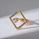 Ring "Trend" rhinestone in the middle, the color is white in gold (from 19 size)
