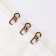 Hook for curtains on a ring, 30 × 13 mm, brown color