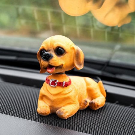 Dog on a car panel shocking his head, SP15-1