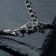Unisex “Skull” pendant with wings, color black silver on a black lace, 40 cm