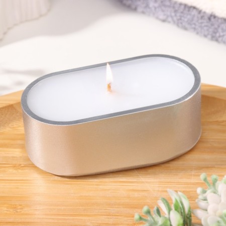 Candle in an oval candlestick of gypsum, 9.5x4.7x3cm, silver