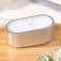 Candle in an oval candlestick of gypsum, 9.5x4.7x3cm, silver