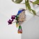 Brooch "Bird" baby on a branch, colored in gold