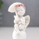 Polystone souvenir "Snowty angel in a pink wreath, on a ball under an umbrella" 8.5x3.8x3 cm