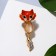 Brooch "Fox" with a movable tail, colored in gold