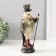 Polystone souvenir "Eagle in the cylinder with a pen, with a cane" 12x10x30 cm