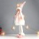 Interior doll "Girl with braids, in cap, white-pink outfit" 63x20x13 cm