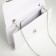 Female bag on a magnet, white color