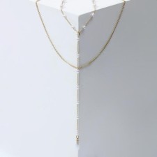 The necklace with pearls “chain” is small beads, ball No. 2, white color in gold, l = 50 cm