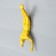 Souvenir Polystone "Free fall" yellow 30x12x9 cm