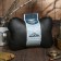 Car gift, bone, on a headrest, "real man", eco -leather, black, 16 x 24 cm