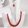 Set 3 objects: earrings, beads, bracelet "coral" ball