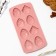 Silicone form for baking "chickens", 10.6 x 20.7 cm.