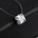 Piece "on the fishing line" Cube, white color in silver, 30 cm