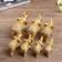 Souvenir Polystone "Golden Elephants - Roots of Trees" Nr 7 pcs H = 9; 8.5; 7.7; 6.5; 6.2; 5.4; 4.2 cm
