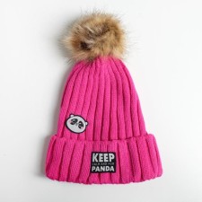 Women's hat with pompon 