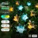 Garland “thread” 4.5 m with nozzles “Flowers”, IP44, Dark Thread, 30 LED, Glash glow/Aquamarine, 2 modes, solar battery