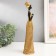 Souvenir Polystone "African in a wicker dress" Gold 27x8x6 cm