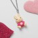 Children's pendant "chosen" hare, beige-pink color