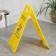 The sign "Caution! Wet floor ”, 61 × 30 cm, plastic, yellow color