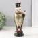 Polystone souvenir "Eagle in the cylinder with a pen, with a cane" 12x10x30 cm