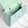 Female bag on a magnet, green color