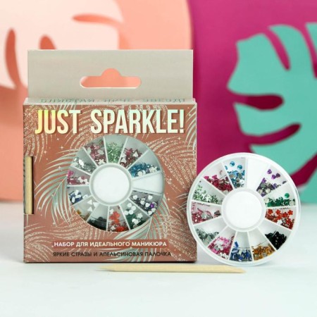 A set of curly rhinestones for nail decor (12 colors) and a Just Sparkle orange stick!