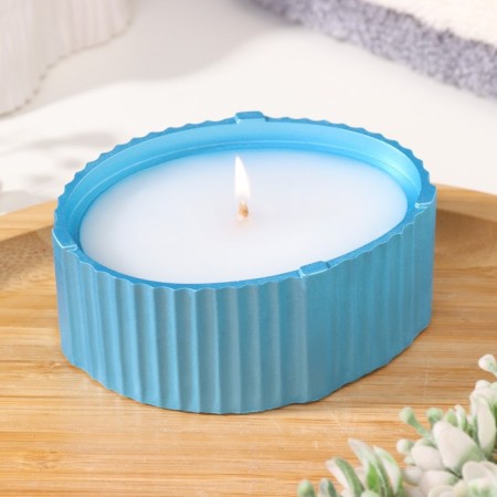 Candle "Oval" in a candlestick with narrow faces, 9x6.5x4cm, blue