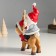 Suvenir Polystone "Santa Claus riding Oleska in a red cap and scarf" 8x14x23 cm