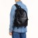 City backpack on a zipper, black color