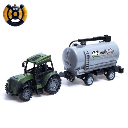 Radio -controlled “farmer” tractor with a tank, works from batteries, green color