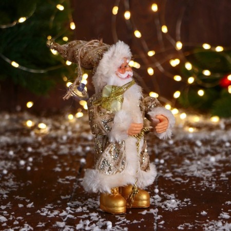 Santa Claus "in a cap, with a gift" 17 cm, gold-1