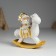 Suvenir Polystone "Santa Claus in a gold caftan on a cap-cap" 10.5x6x11.5 cm