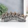 Polystone souvenir "Seven elephants on a tusk with flowers" silver 21x4x9.8 cm