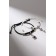 Bracelets "Demetrons" key with a lock, black and white color, 7 cm