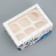 The folding box is 6 cupcakes with the “Fun New Year” window, 25 x 17 x 10 cm, New Year