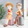 Souvenir Polystone "Boy with a guitar/Girl with a camera on the suitcase" MIX 8x4.5x17 cm