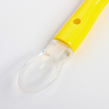 A spoon for nursery for feeding silicone, from 5 months, yellow color-1