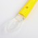 A spoon for nursery for feeding silicone, from 5 months, yellow color