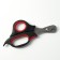 Middle scissors are medium with an emphasis for a finger, black with red