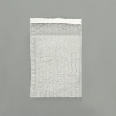 A package of runway with a valve and an adhesive layer, p/e, 3 layers, 12 x 21 + 5 cm-1