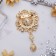 Brooch "Empress" circle, white color in gold