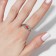 Amore ring is heart in a circle, pink color in silver, dimensionless