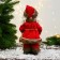 Santa Claus "In a caftan with buttons and a bag" 30 cm, moves, red-brown